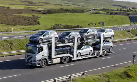 Multi-level car carrier on the motorway to Aberdeen, United Kingdom