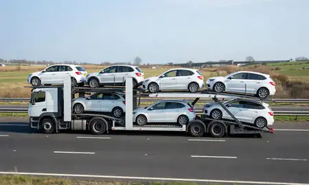Multi-level car carrier on the motorway to Bedfordshire, United Kingdom