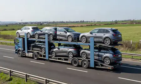 Multi-level car carrier on the motorway to Bedford, Bedfordshire, United Kingdom