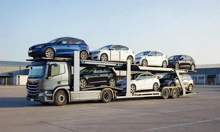 Car transporter loaded with vehicles in Bedford, Bedfordshire, United Kingdom