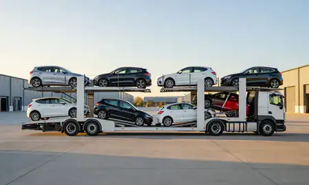Car transporter parked in an industrial area of Luton, Bedfordshire, United Kingdom