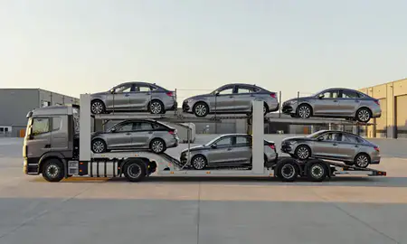 Car transporter parked in an industrial area of Berkshire, United Kingdom