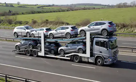 Multi-level car carrier on the motorway to Bracknell, Berkshire, United Kingdom