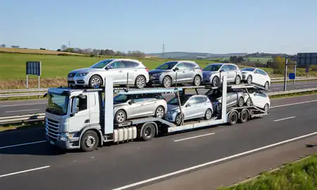 Multi-level car carrier on the motorway to Maidenhead, Berkshire, United Kingdom