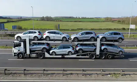 Multi-level car carrier on the motorway to Newbury, Berkshire, United Kingdom