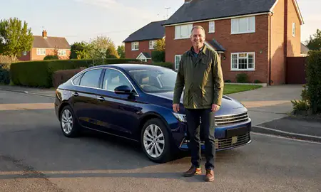 Customer with their delivered car in Newbury, Berkshire, United Kingdom