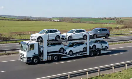 Multi-level car carrier on the motorway to Reading, Berkshire, United Kingdom