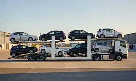 Car transporter parked in an industrial area of Woodley, Berkshire, United Kingdom