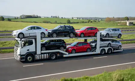 Multi-level car carrier on the motorway to Buckinghamshire, United Kingdom