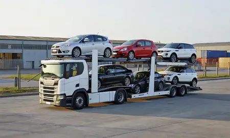 Car transporter loaded with vehicles in Buckinghamshire, United Kingdom