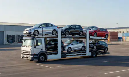 Car transporter loaded with vehicles in Aylesbury, Buckinghamshire, United Kingdom
