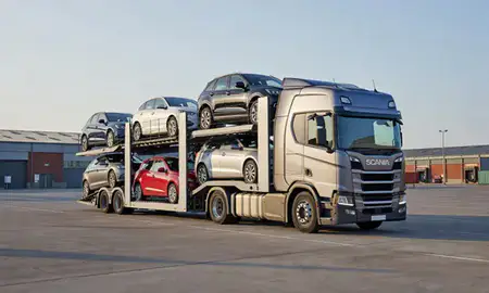 Car transporter loaded with vehicles in Bletchley, Buckinghamshire, United Kingdom
