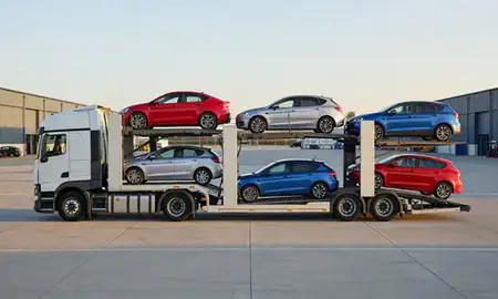 Car transporter parked in an industrial area of High Wycombe, Buckinghamshire, United Kingdom