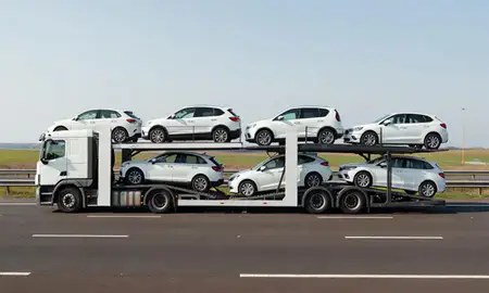 Multi-level car carrier on the motorway to Cambridgeshire, United Kingdom