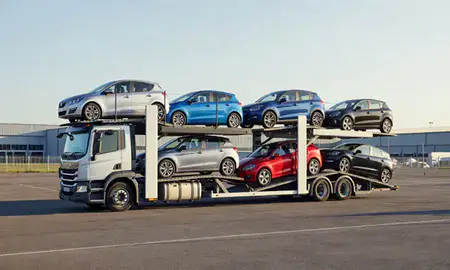 Car transporter loaded with vehicles in Cambridgeshire, United Kingdom