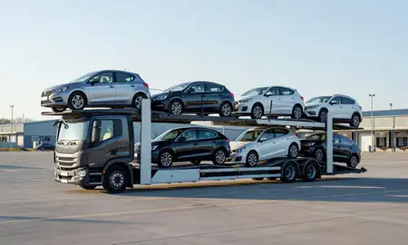 Car transporter loaded with vehicles in Cambridge, Cambridgeshire, United Kingdom