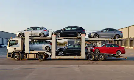 Car transporter parked in an industrial area of Peterborough, Cambridgeshire, United Kingdom