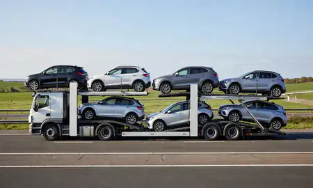 Multi-level car carrier on the motorway to Cheshire, United Kingdom