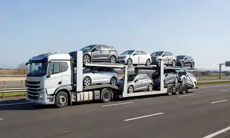 Multi-level car carrier on the motorway to Chester, Cheshire, United Kingdom