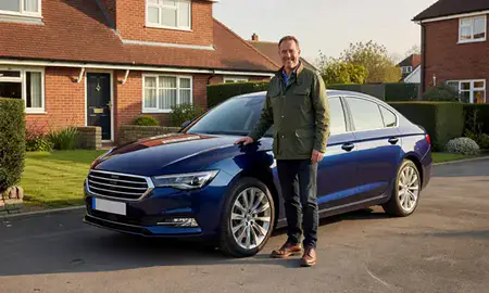 Customer with their delivered car in Northwich, Cheshire, United Kingdom