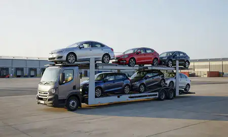 Car transporter loaded with vehicles in Runcorn, Cheshire, United Kingdom