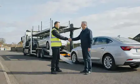 Vehicle owner beside their delivered car in Wilmslow, Cheshire, United Kingdom