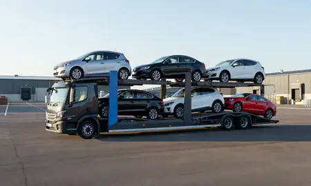 Car transporter loaded with vehicles in Wilmslow, Cheshire, United Kingdom