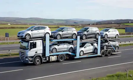 Multi-level car carrier on the motorway to Lisburn, County Antrim, United Kingdom