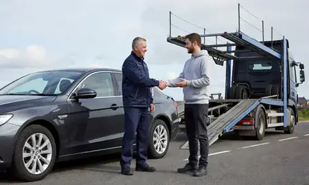Vehicle owner beside their delivered car in Lisburn, County Antrim, United Kingdom
