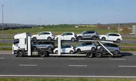 Multi-level car carrier on the motorway to Newtownabbey, County Antrim, United Kingdom