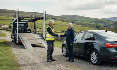 Vehicle owner beside their delivered car in County Armagh, United Kingdom
