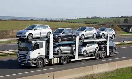 Multi-level car carrier on the motorway to Craigavon, County Armagh, United Kingdom