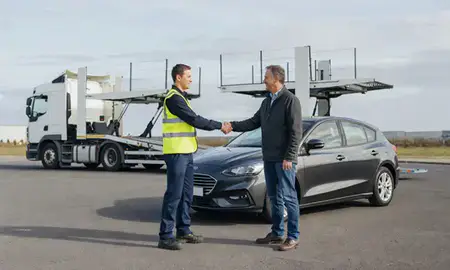 Vehicle owner beside their delivered car in Hartlepool, County Durham, United Kingdom