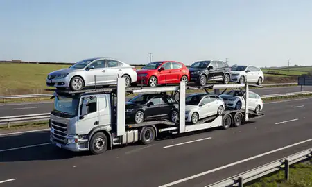Multi-level car carrier on the motorway to Stockton-on-Tees, County Durham, United Kingdom