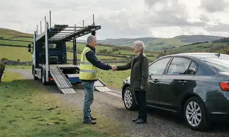Vehicle owner beside their delivered car in County Londonderry, United Kingdom