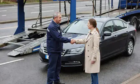 Vehicle owner beside their delivered car in Derry/Londonderry, County Londonderry, United Kingdom