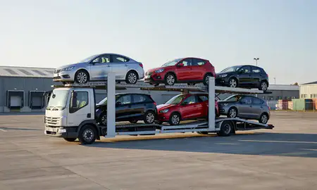 Car transporter loaded with vehicles in Barrow-in-Furness, Cumbria, United Kingdom