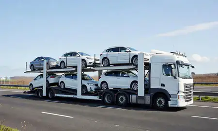 Multi-level car carrier on the motorway to Carlisle, Cumbria, United Kingdom
