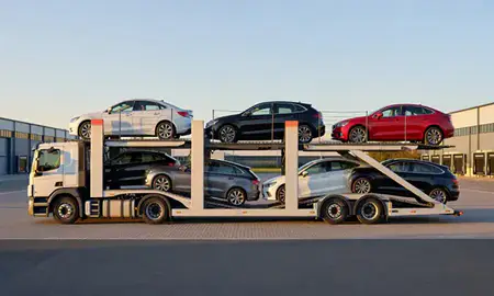 Car transporter parked in an industrial area of Derbyshire, United Kingdom