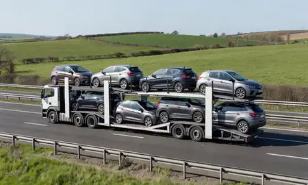 Multi-level car carrier on the motorway to Chesterfield, Derbyshire, United Kingdom