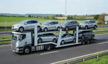 Multi-level car carrier on the motorway to Long Eaton, Derbyshire, United Kingdom