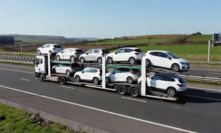 Multi-level car carrier on the motorway to Devon, United Kingdom