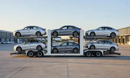Car transporter parked in an industrial area of Devon, United Kingdom