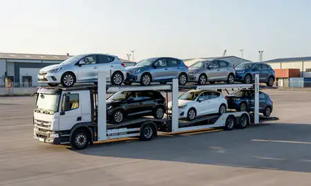 Car transporter loaded with vehicles in Exeter, Devon, United Kingdom