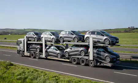 Multi-level car carrier on the motorway to Paignton, Devon, United Kingdom