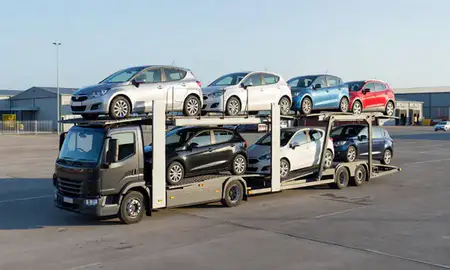 Car transporter loaded with vehicles in Plymouth, Devon, United Kingdom