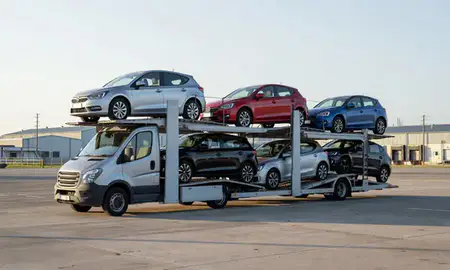 Car transporter loaded with vehicles in Bournemouth, Dorset, United Kingdom
