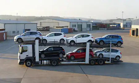 Car transporter loaded with vehicles in Poole, Dorset, United Kingdom