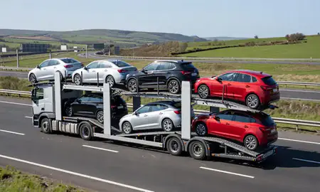 Multi-level car carrier on the motorway to Dundee, United Kingdom