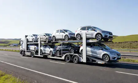 Multi-level car carrier on the motorway to Dyfed, United Kingdom